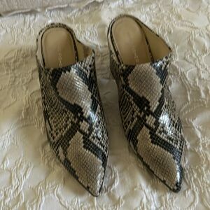 Marc Fisher , mules aren’t mushy ,They are well constructed, sturdy.